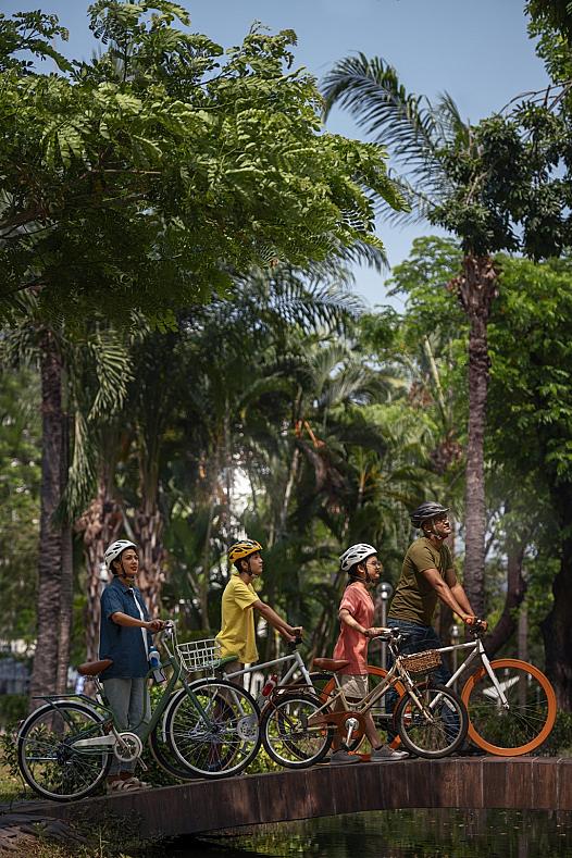 full-shot-family-cycling-outdoors